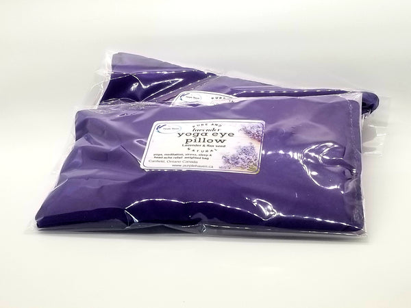 Dark purple Yoga Lavender Eye Pillow filled with lavender buds and flaxseed for relaxation and meditation.