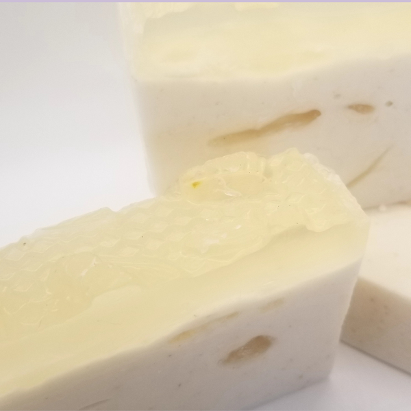 Lavender Honey Oatmeal Soap showcases a creamy blend of natural ingredients for nourishing skin care.