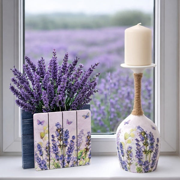 Decorative items with lavender theme in front of a window with a view of a lavender field.