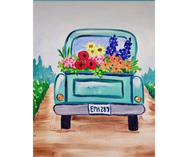 Teal vintage truck filled with a vibrant bouquet of flowers on a dirt road - Paint Night on the Farm with Dinner.
