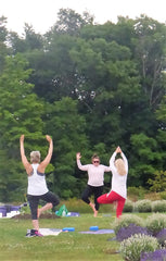 Participants enjoying the Wellness Make & Take Yoga Day Retreat at Purple Haven, connecting with nature and tranquility.
