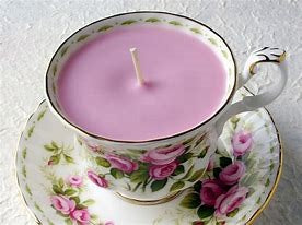 Delight in a pink candle in a floral cup for Mother's Day Afternoon Tea May 10, 2025, 11am till 2pm at our store.