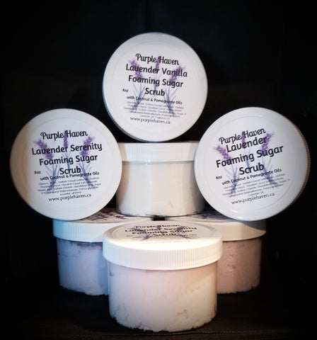Luxurious Foaming Sugar Scrub from Purple Haven for gentle exfoliation and silky smooth skin with coconut and pomegranate oils.